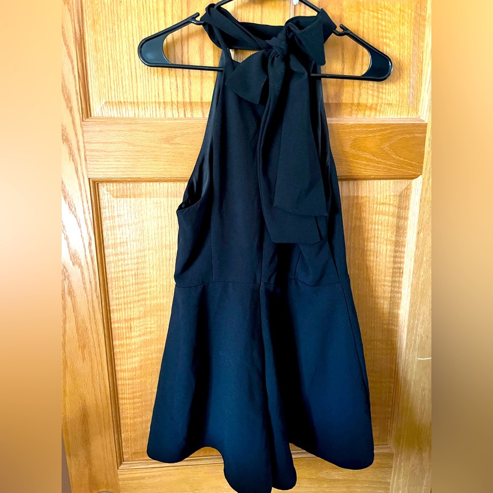 Black romper from a boutique